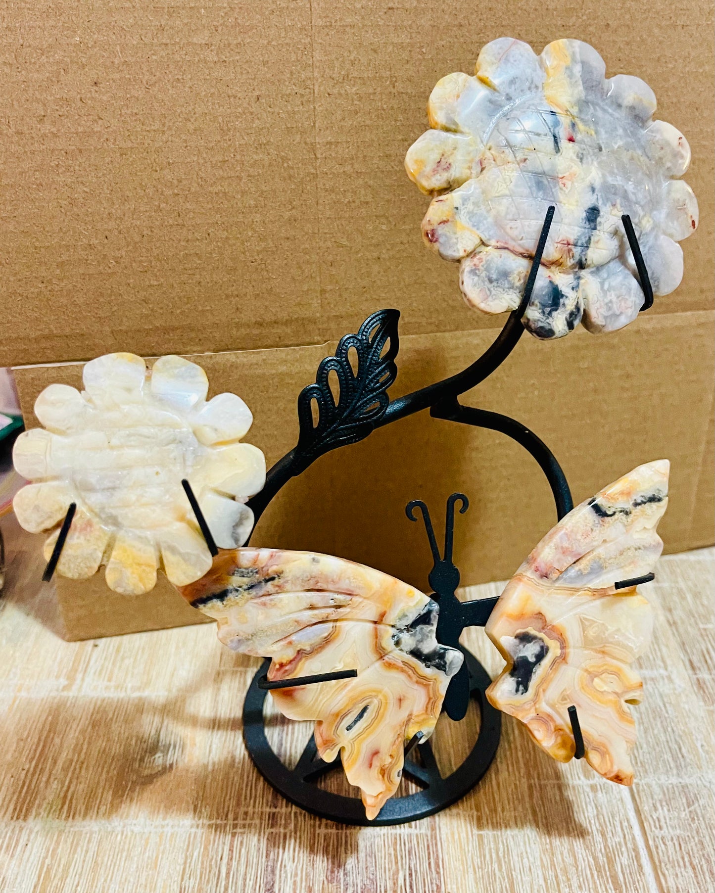 Butterfly and flower carving on stand